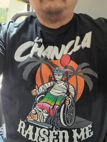 Customer photo review of La Chancla Raised Me Old School Tee