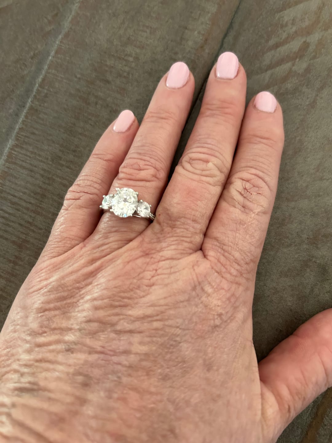 Customer photo review of Three Stone Oval Moissanite Channel-Set Engagement Ring