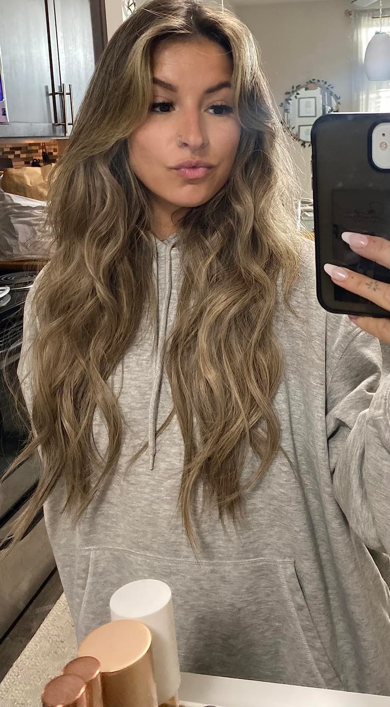 Customer photo review of 【New Color】Moresoo Virgin Tape In Hair Extensions 100% Brazilian Human Balayage Blonde Hair (#8/8/613)