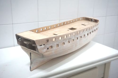 Reseña con foto de un cliente sobre Belle Poule Maqueta