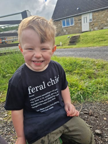 Customer photo review of Feral Definition Kids Tee