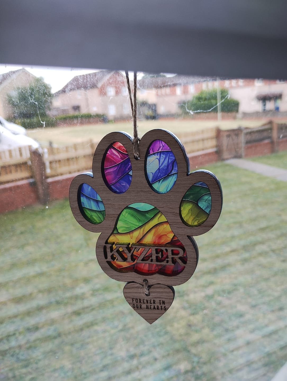 Customer photo review of Rainbow Dog Paw Stained Glass
