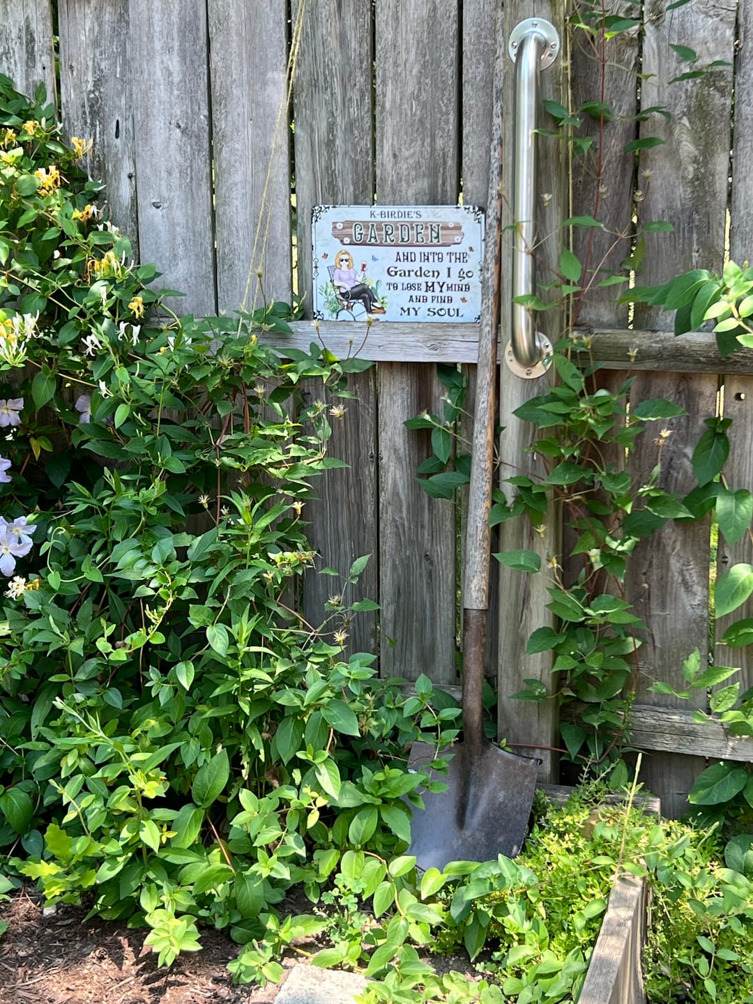 Customer photo review of And Into The Garden I Go Gardening Girl - Garden Sign - Personalized Custom Classic Metal Signs