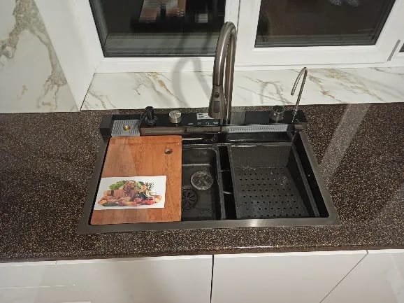 Customer photo review of Stainless Steel Kitchen Sink with Double Waterfall Design, Large Single Basin, Embossed Surface, and Ambient Light Digital Display
