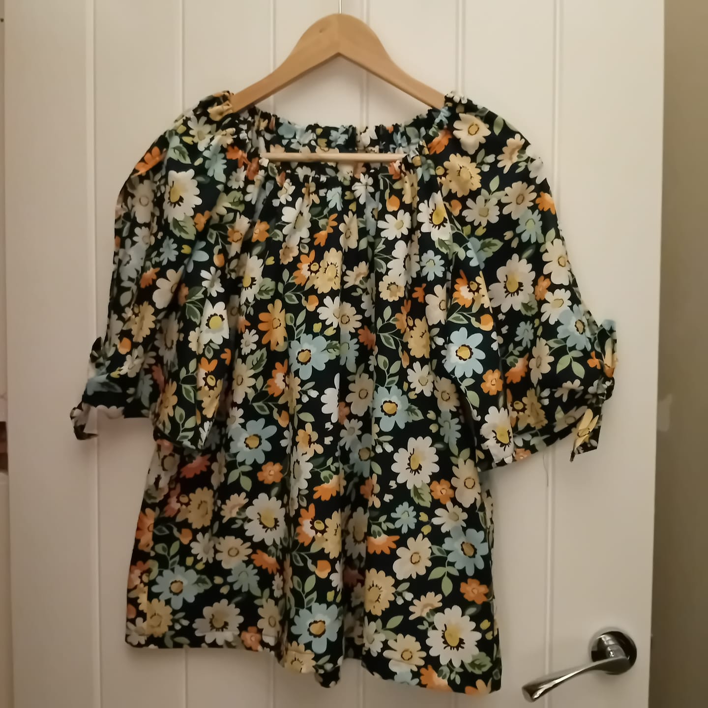Customer photo review of Blue, Orange and White Floral on Navy Cotton Poplin Fabric