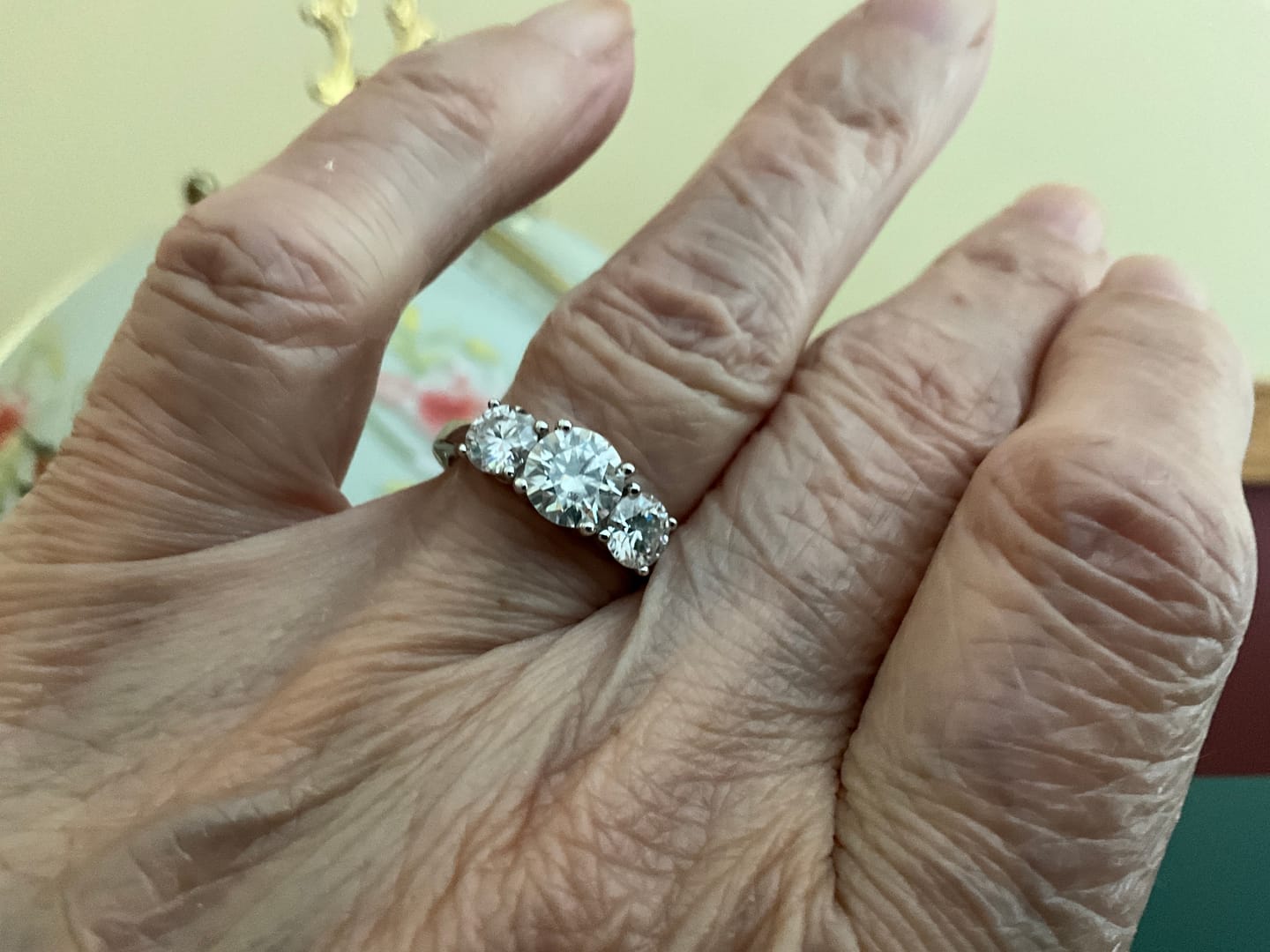 Customer photo review of Classic Three Stone Round Cut Moissanite Engagement Ring