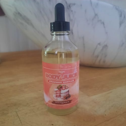 Customer photo review of Naomi Body Juice Oil - 4 OZ