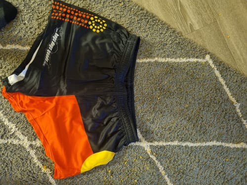 Customer photo review of Footy Shorts - Indigenous Flag