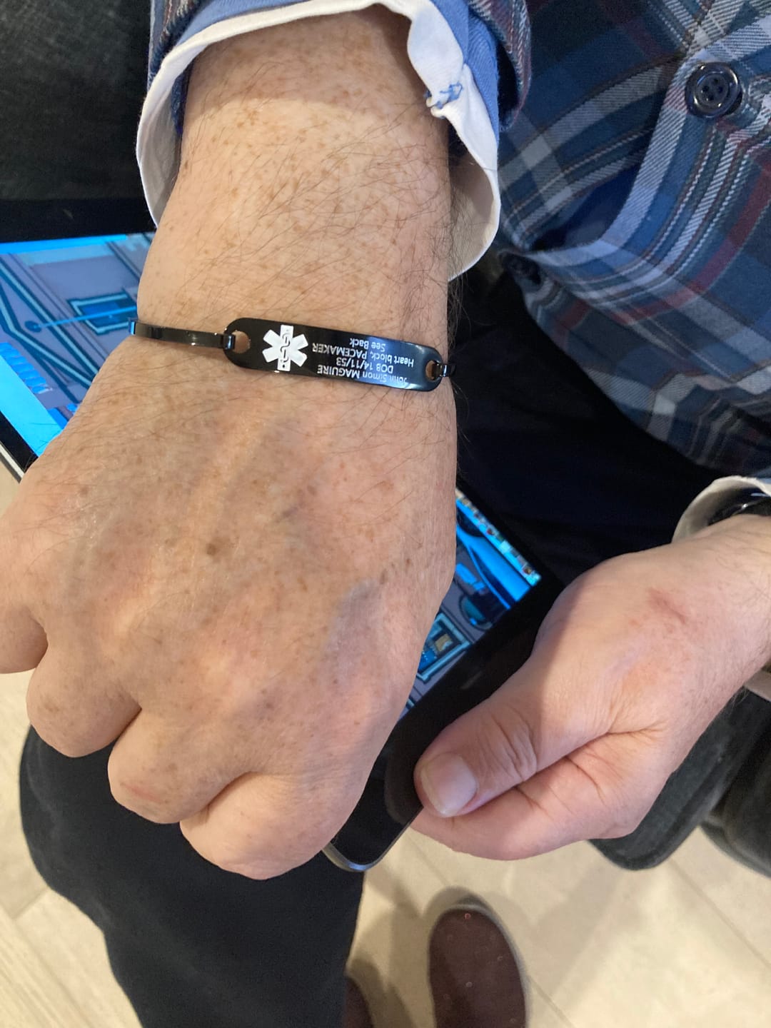 Customer photo review of Personalised Unisex Black Medical Alert ID Bangle Bracelet