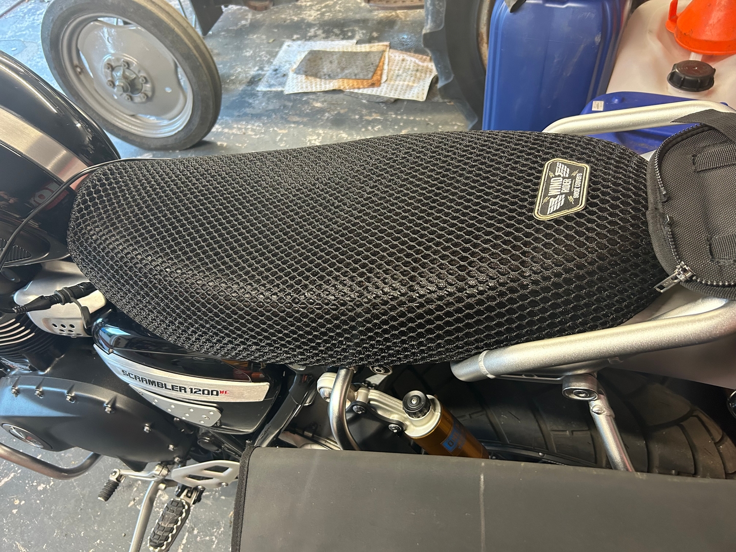 Wind Rider mesh seat cover on a Triumph Scrambler 1200