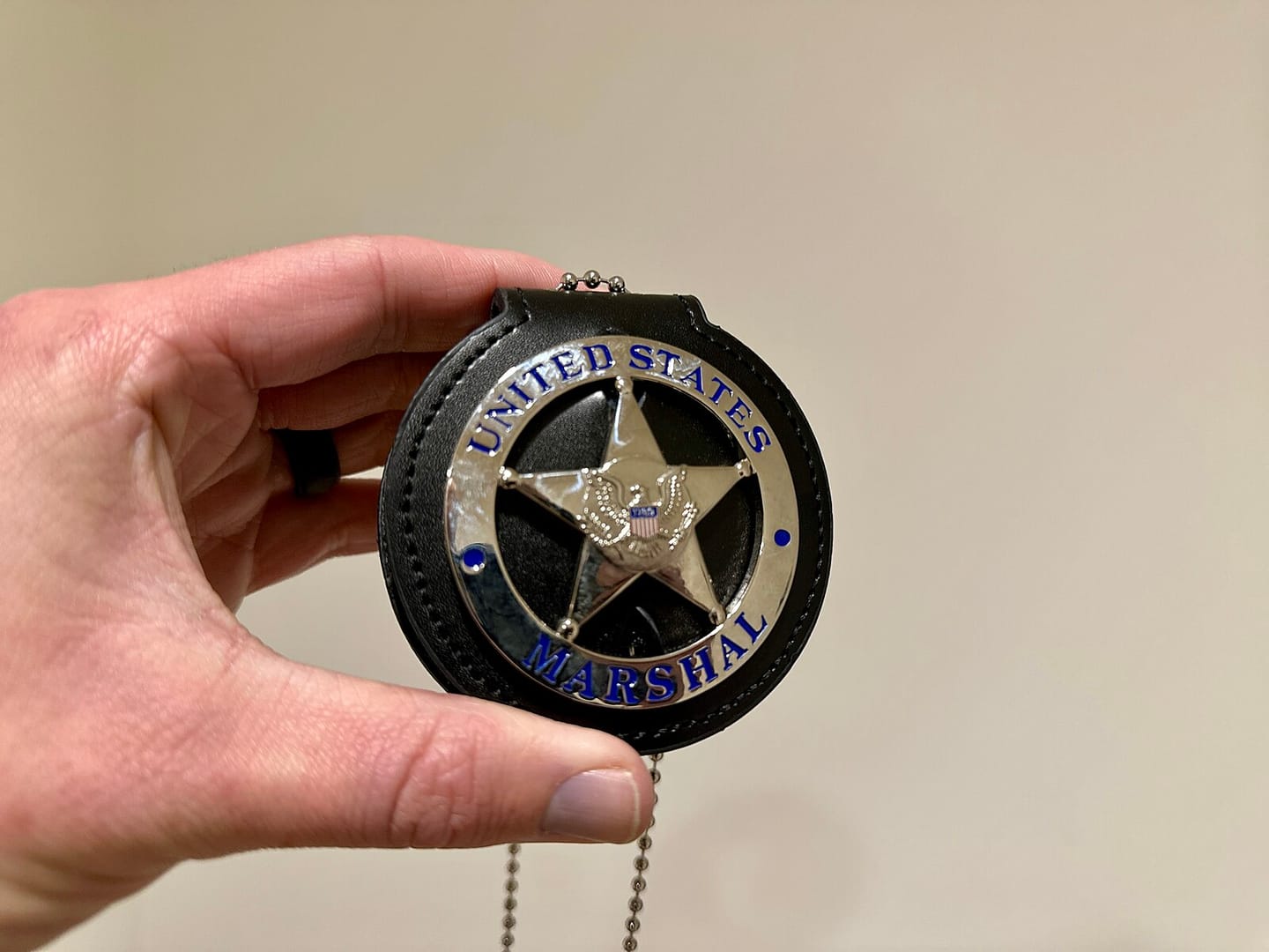 Customer photo review of US Federal Court Law Enforcement MARSHAL Badge Solid Copper Replica Movie Props