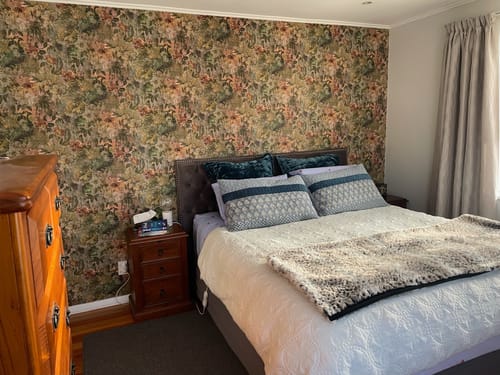 Customer photo review of Thalia - Peacock Distressed Concrete Wallpaper - Navy