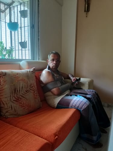 Customer photo review of Shoulder Immobilizer | Provides Firm Support for Shoulder Dislocation & Relieves Pain (Grey)