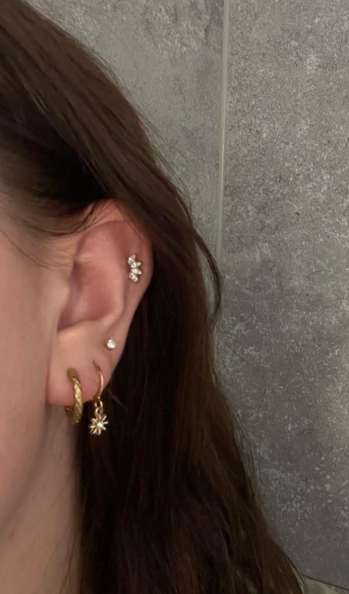 Customer photo review of Lotus Piercing | Titan