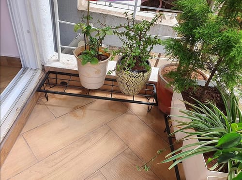 Customer photo review of United Crafts Indoor/Outdoor Flower Pot/Plant Stand (Set of 4)