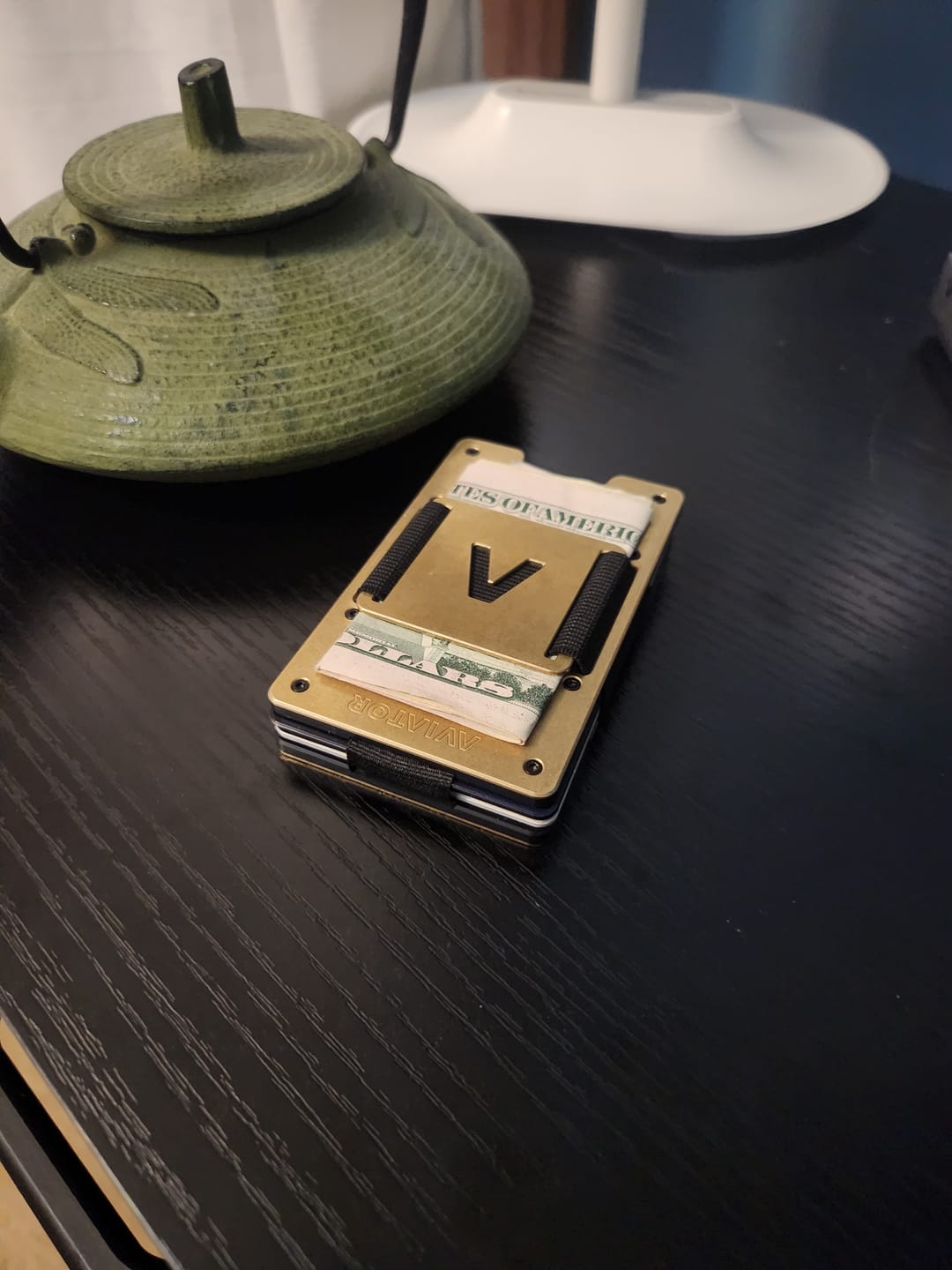 Customer photo review of Stonewashed Brass | Slide ONE Wallet + Brass Cash Clip