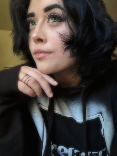 Customer photo review of Dilated Green Contact Lenses(12 months of use)