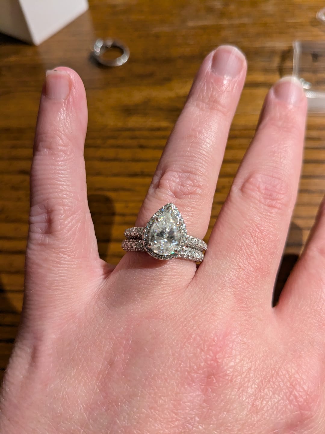 Customer photo review of Halo Pear Moissanite Triple Row Pave Engagement Ring