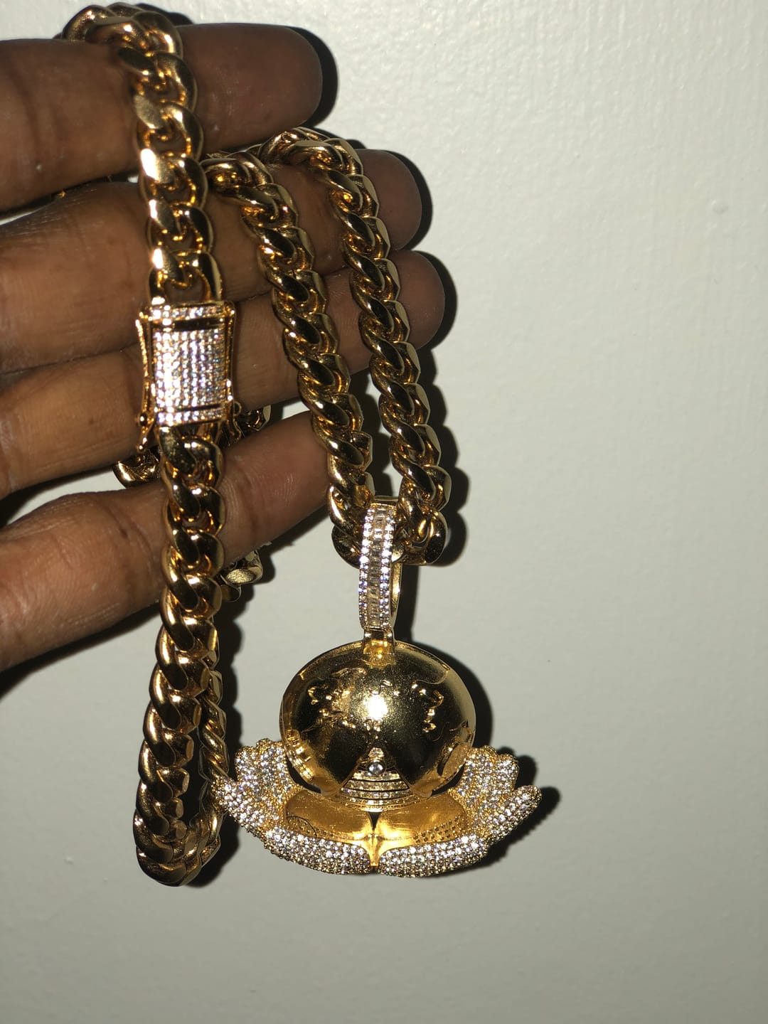 Customer photo review of The World Is Yours Pendant