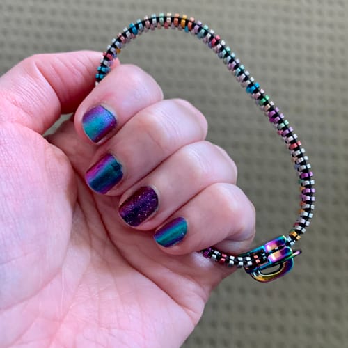 Customer photo review of Unisex Oil Slick Metal Zipper Bracelet By Kaiko