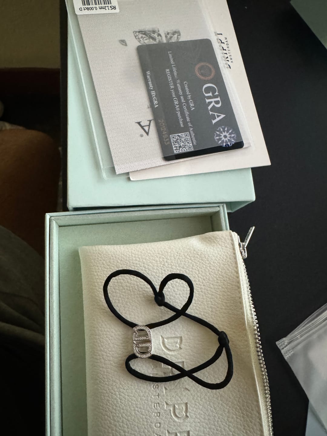 Customer photo review of MOISSANITE INFINITY BRACELET. - WHITE GOLD