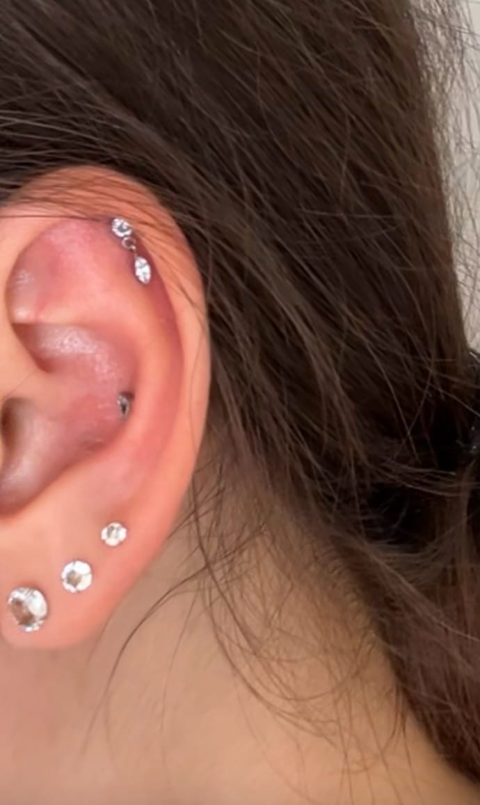 Customer photo review of Hanging Point Piercing | Titan