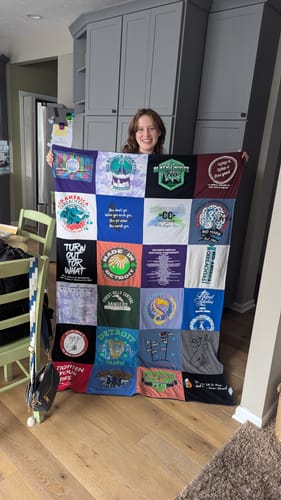 T-shirt quilt with camping, leadership themes by Robin from MI