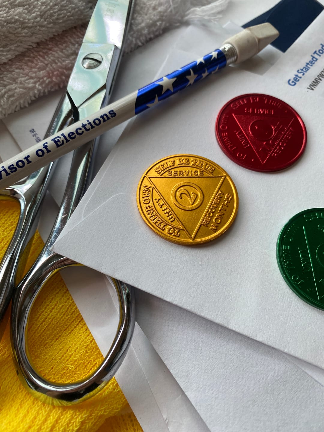 Customer photo review of Sobriety Mint Infinity Aluminum AA Meeting Newcomer Sobriety Chips/Coins/Tokens - 60 Days / 2 Months - Gold
