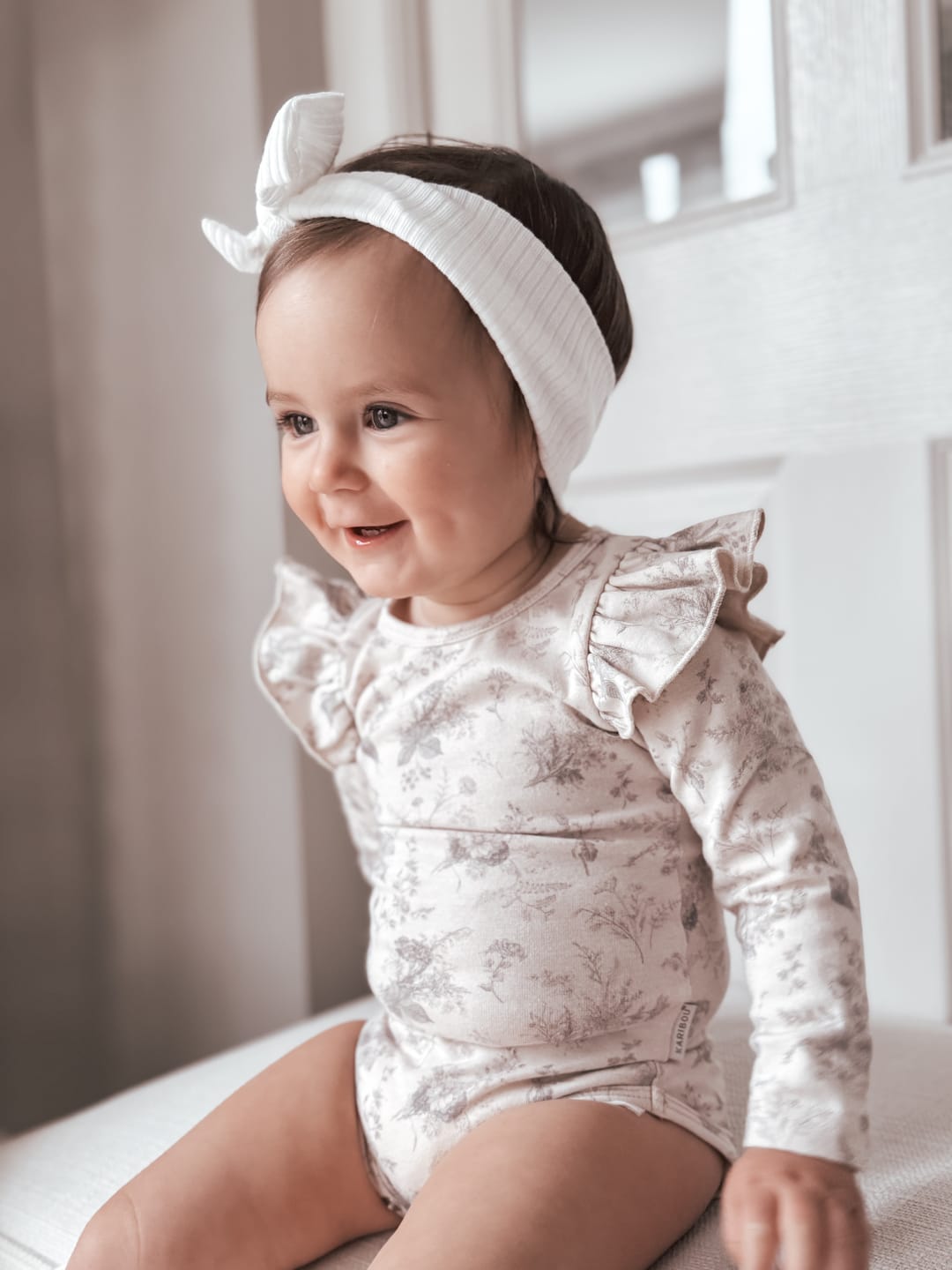Customer photo review of Lilly Organic Cotton Bodysuit - Vintage Floral Beige
