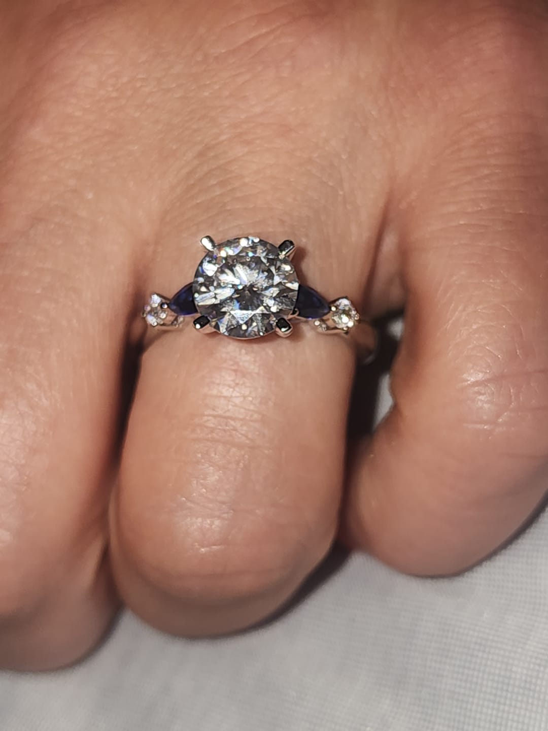 Customer photo review of Five Stone Moissanite And Sapphire Engagement Ring