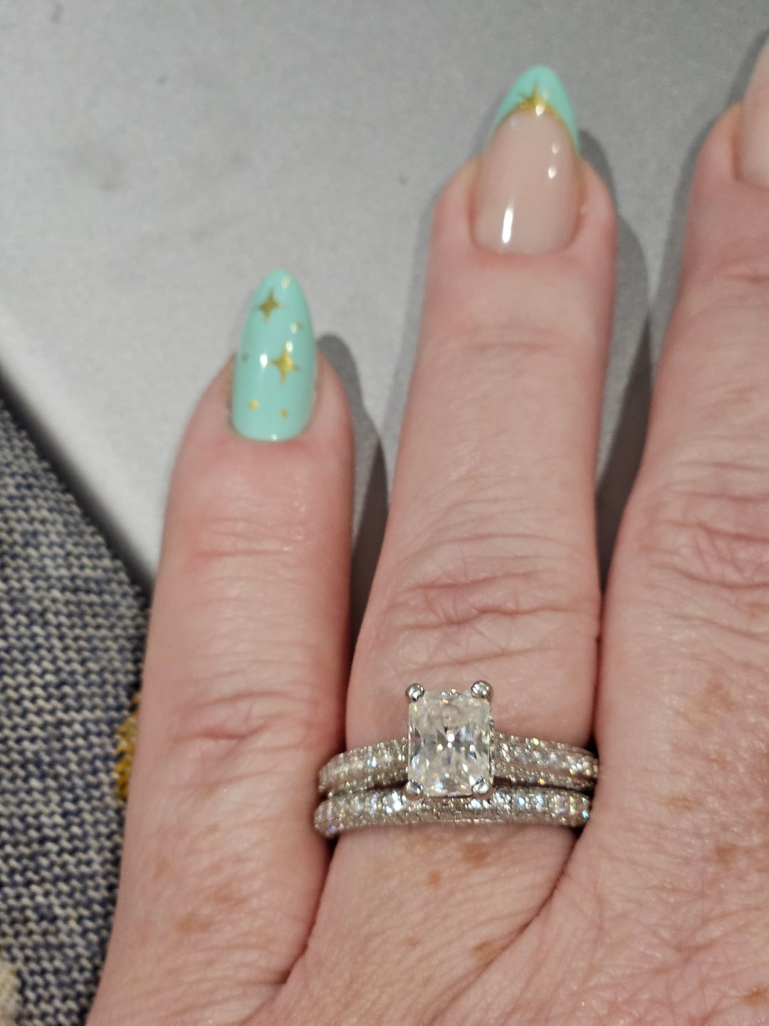 Customer photo review of Hidden Halo Radiant Moissanite Triple Row Pave Engagement Ring