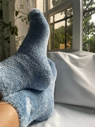 Customer photo review of World's Coziest Fuzzy VIP Socks & Silky Sleep Mask Duo
