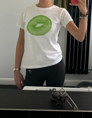Customer photo review of 'Kiwi' baby tee