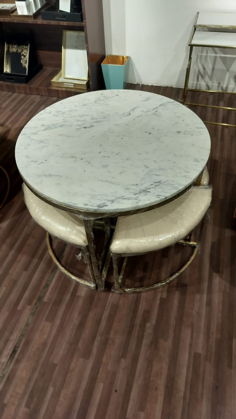 Customer photo review of Terrence Coffee Table with 4 Accent Nesting Stools