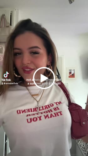 Customer video review of 'My Girlfriend is Hotter Than You' baby tee
