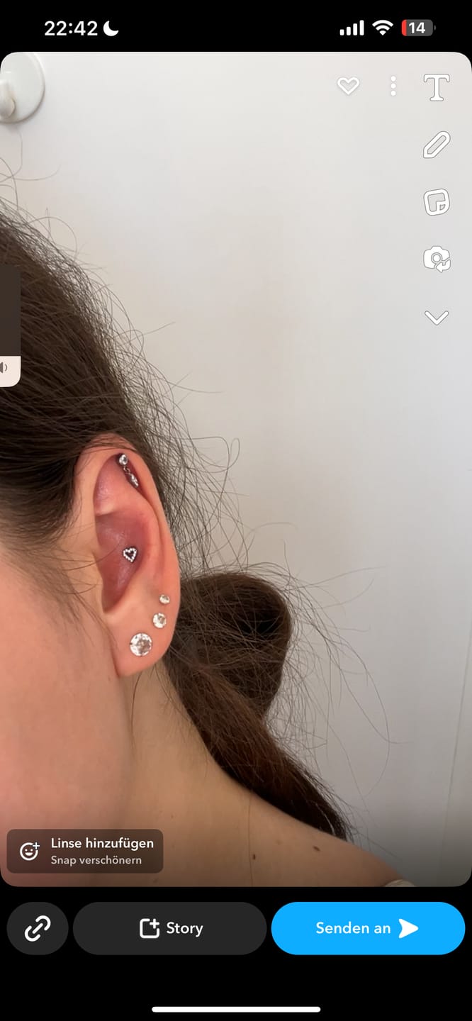 Customer photo review of Heart Piercing | Titan