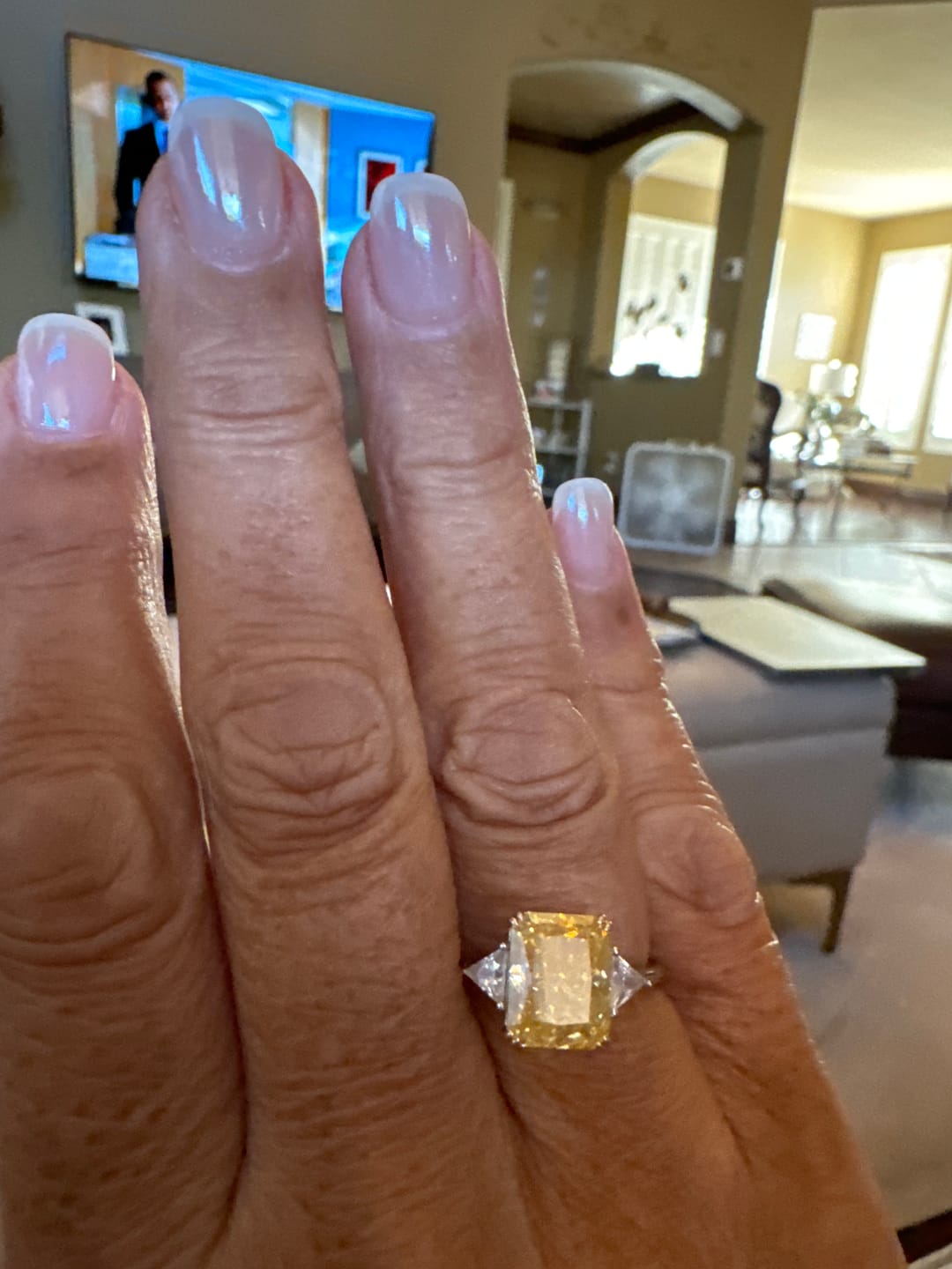 Customer photo review of S925 4.0Ct Radiant & Triangle Cut Yellow Stone Three Stone Engagement Ring In Sterling Silver