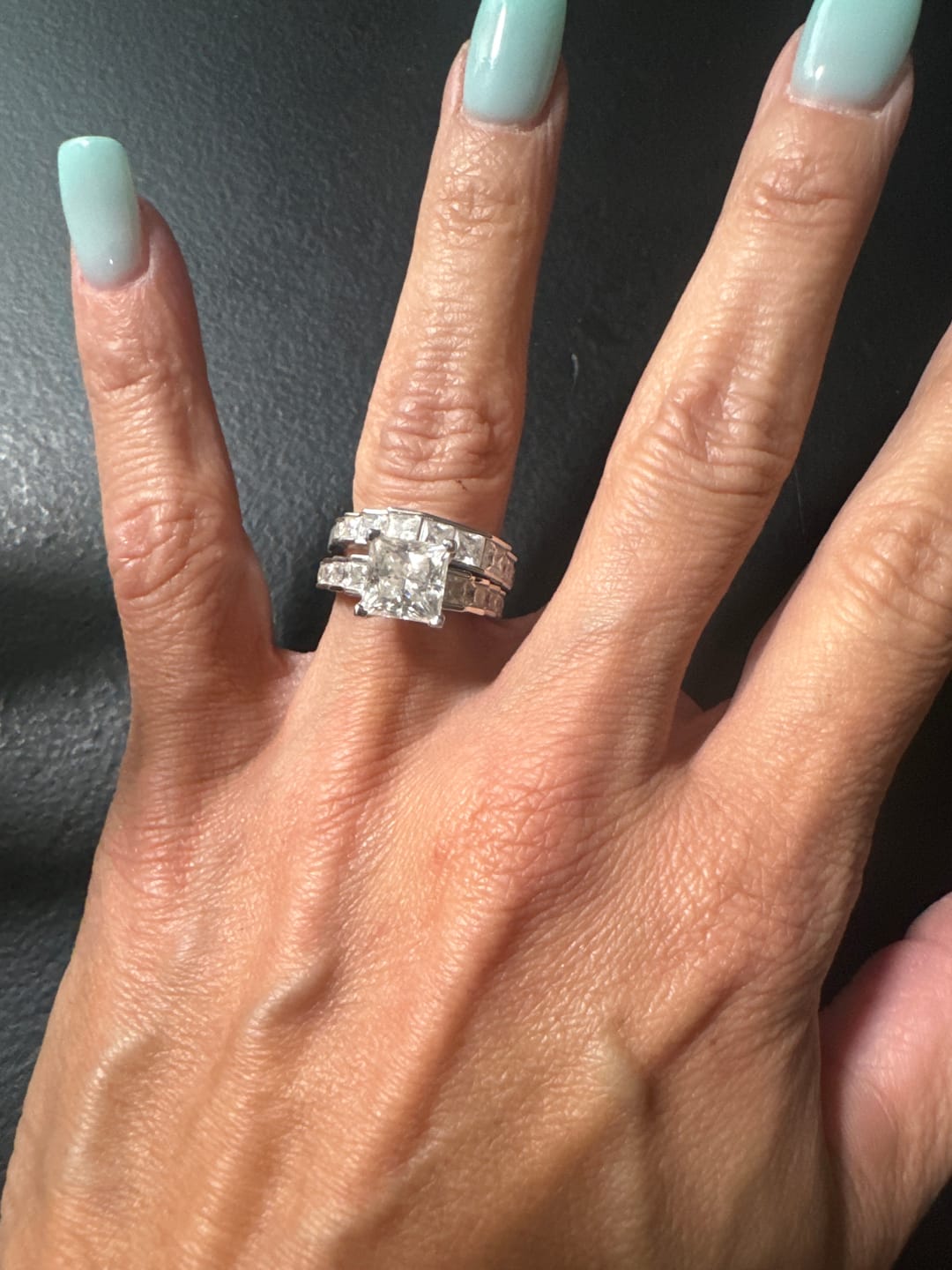 Customer photo review of Princess Cut Moissanite Staircase Channel Set Engagement Ring
