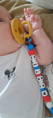 Customer photo review of Kit 2 Chupetes CLÁSICOS Celeste y Mango Nenina & Co