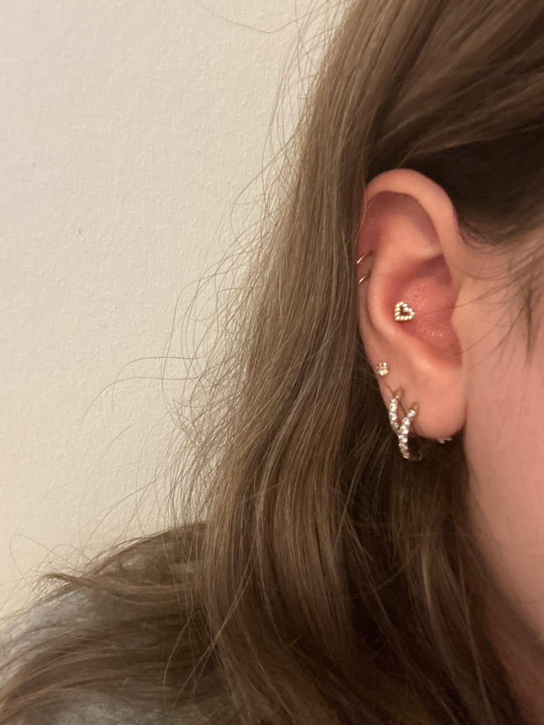 Customer photo review of Heart Piercing | Titan