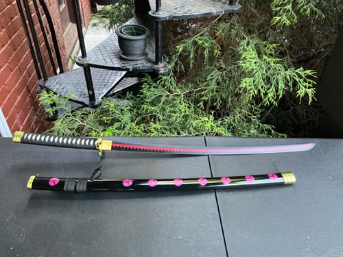 Customer photo review of One Piece Roronoa Zoro Shusui Katana Sword