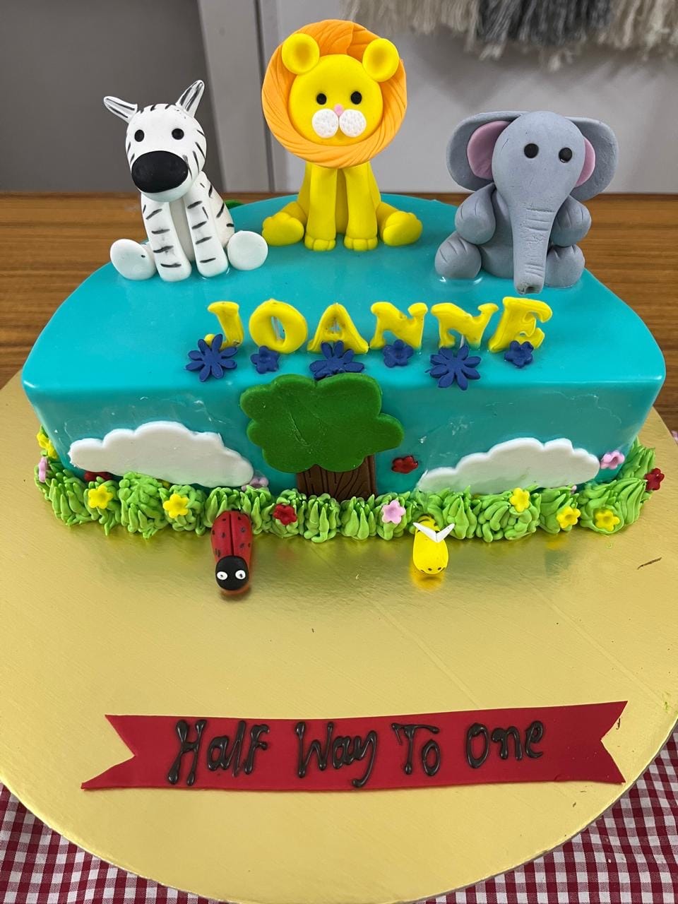 Customer photo review of Half Jungle Design Cake