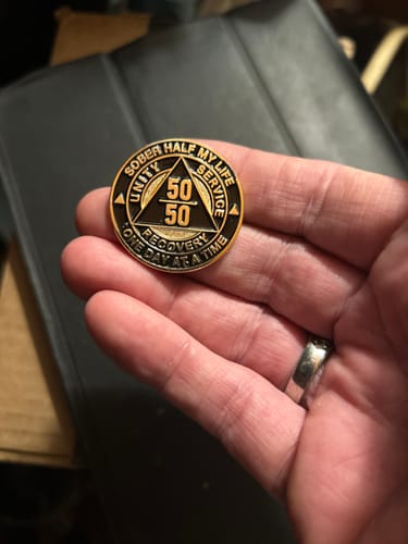 Customer photo review of Sobriety Mint 50/50 Sober Half My Life Specialty AA Recovery Medallion - Polished Gold/Black