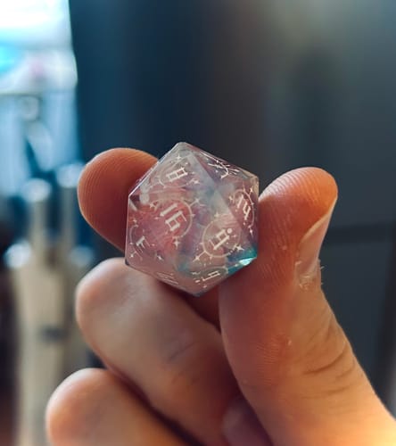 Customer photo review of URWizards D&D Resin Engraved Dice Set Mysterious Realm - Paradise - Bow of Elven