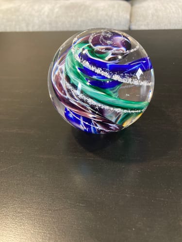 Customer photo review of Blue & Green Cat Eye Orb with Cremation Ashes