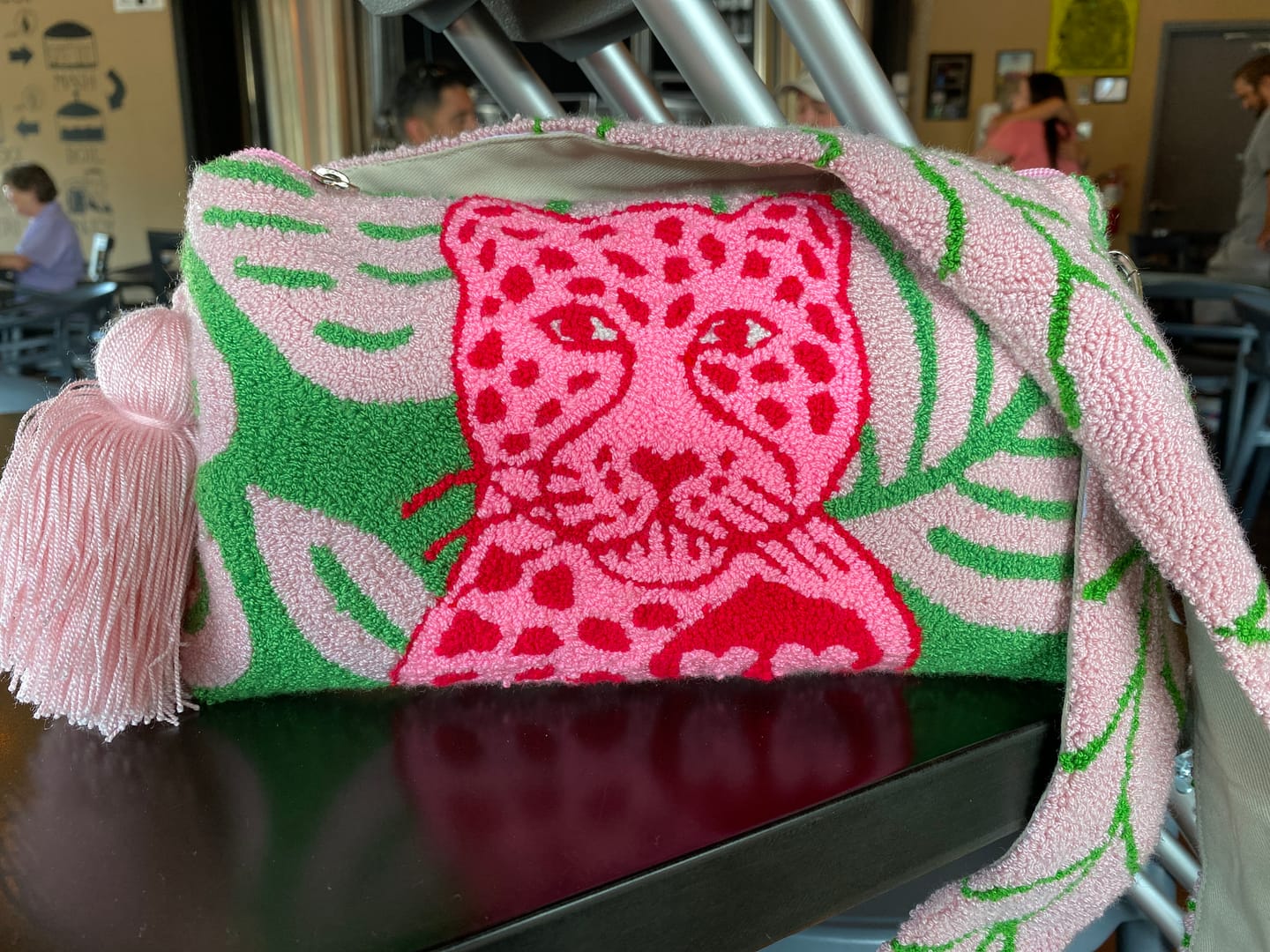 Customer photo review of Sauvage Woven Clutch + Removable Strap
