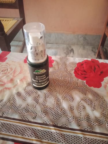 Customer photo review of Activated Charcoal Teeth 🦷 Whitening Treatment - Whitens Teeth Naturally, Kills Cavity causing Bacteria & Eliminates Bad Breath