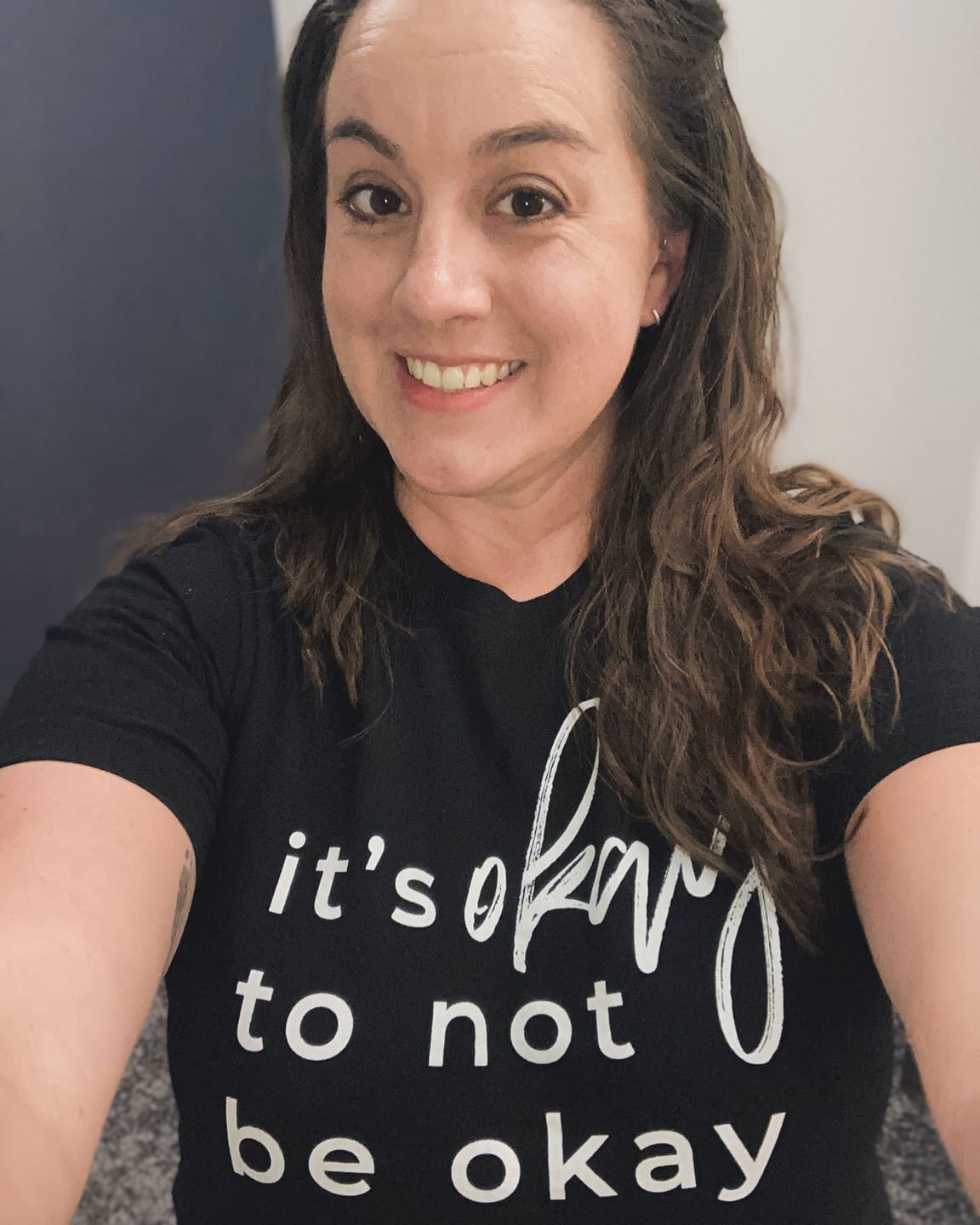 Customer photo review of It's Okay To Not Be Okay T-Shirt