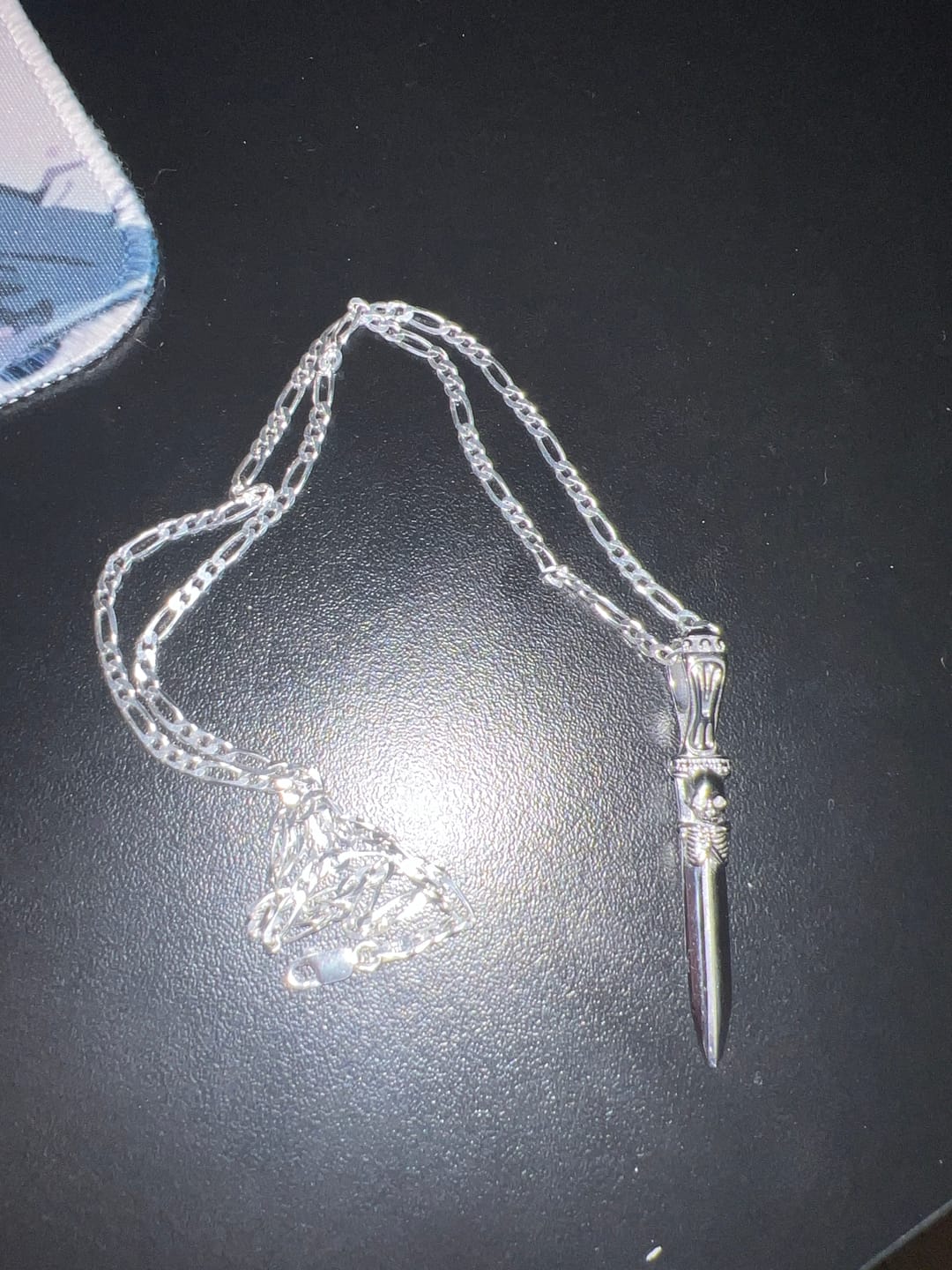 Customer photo review of CATACOMB SWORD PENDANT