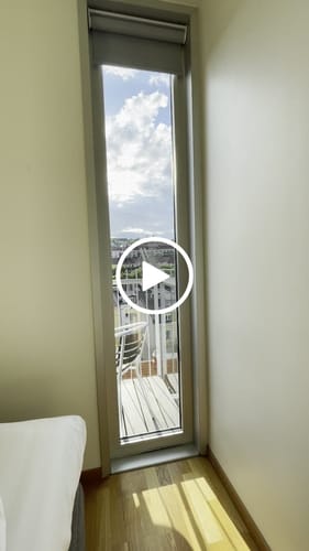 Customer video review of SmartWings Motorized Roller Shades 100% Blackout Vinyl